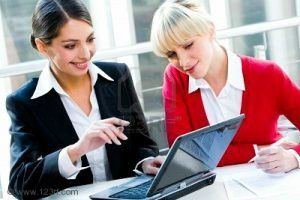 2513177-portrait-of-two-successful-business-women-working-together-business-woman 3